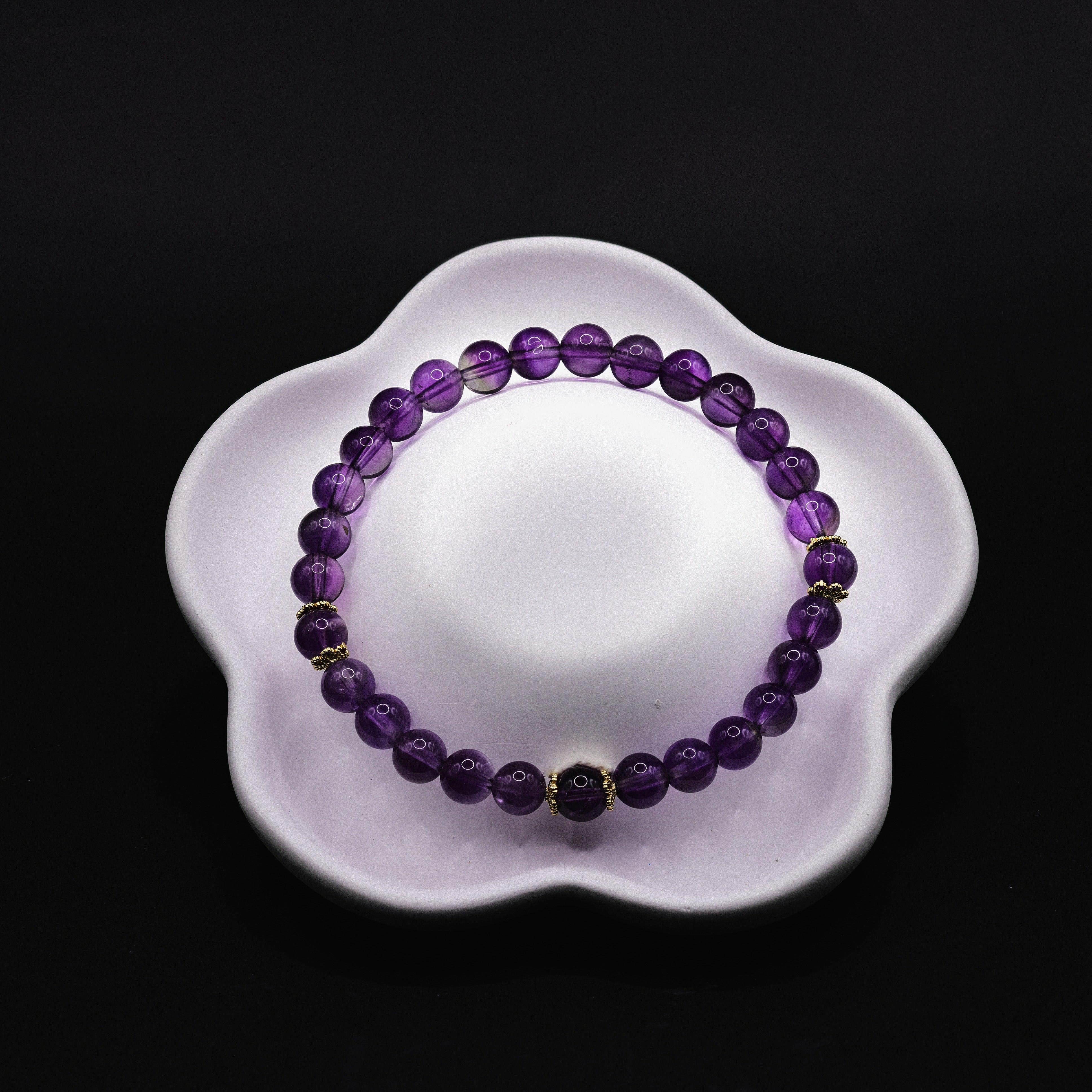 Amethyst-Armband mit elastischem Band und vergoldeten Rondell-Spacern, violette Kugeln