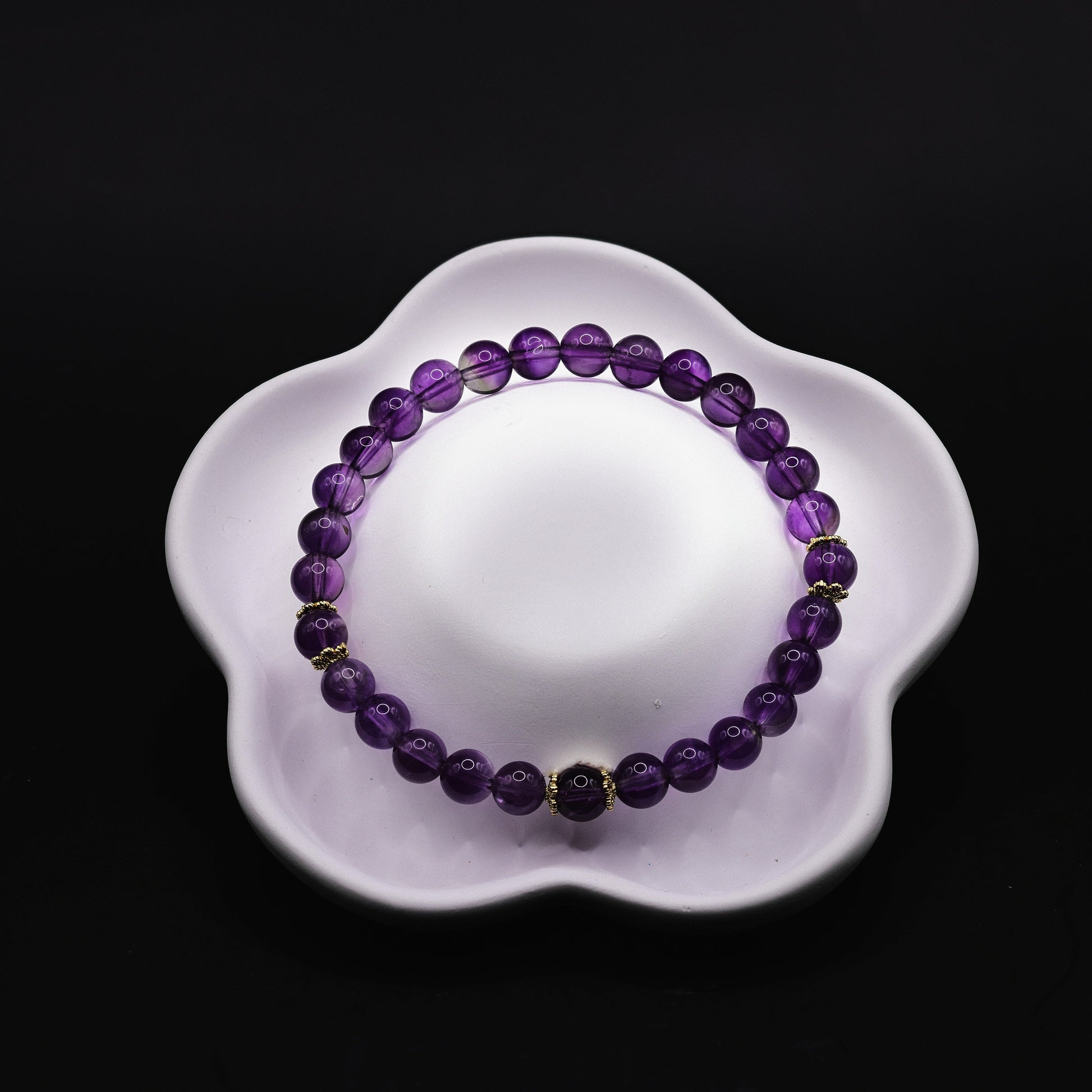 Amethyst-Armband mit elastischem Band und vergoldeten Rondell-Spacern, violette Kugeln
