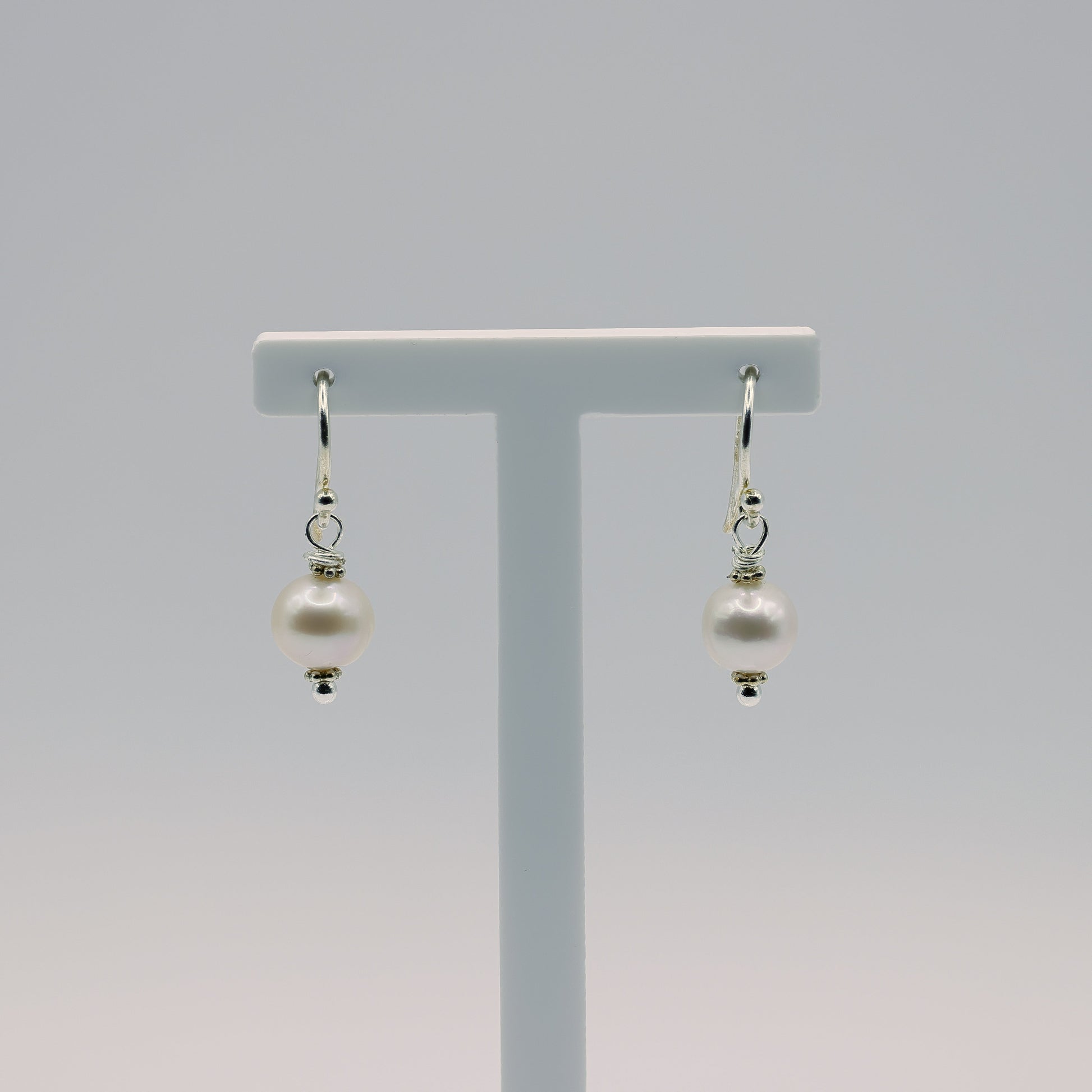 Süsswasserperlen-Ohrhänger lachsrosa, 7 mm, 925 Sterling Silber mit Perlenglanz