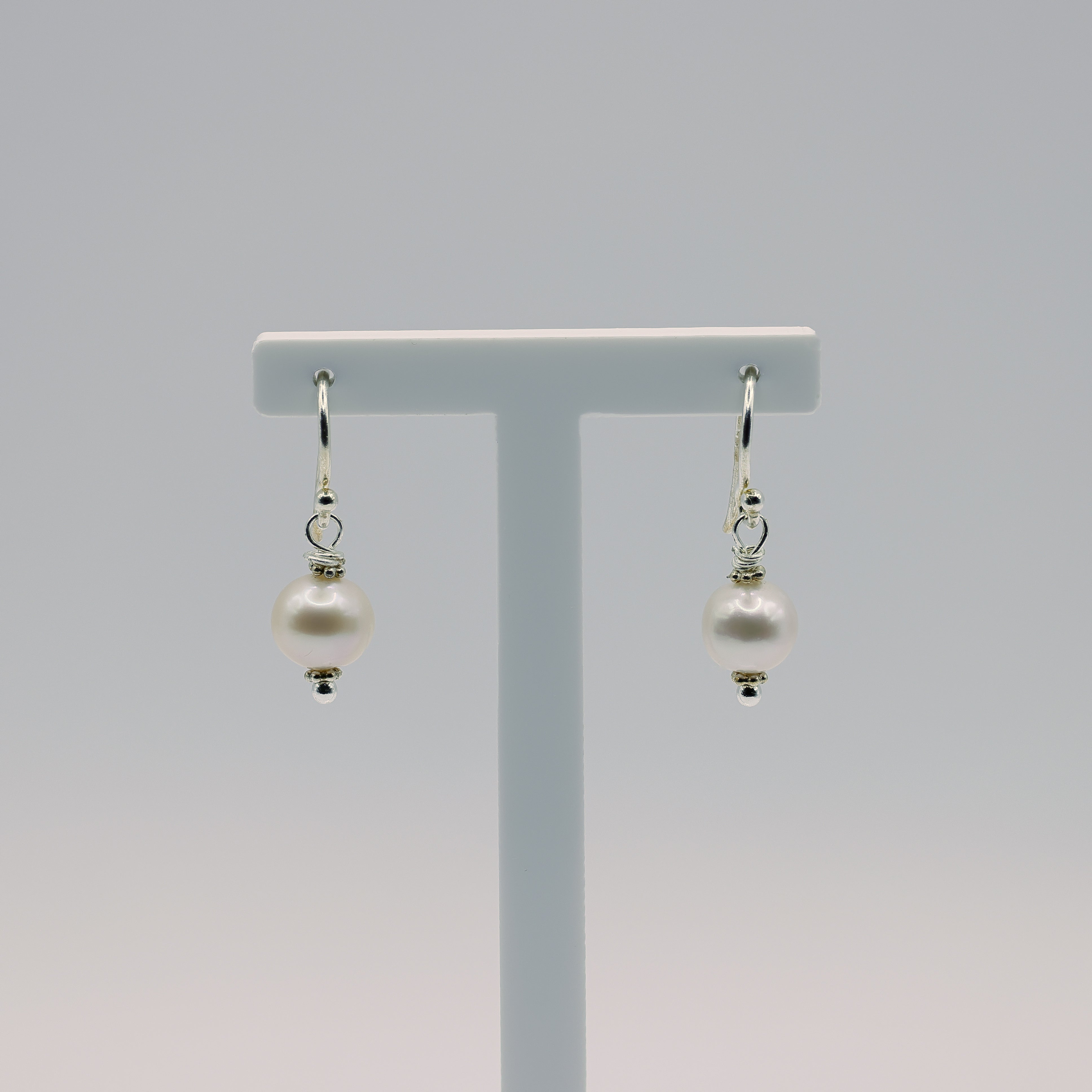 Süsswasserperlen-Ohrhänger lachsrosa, 7 mm, 925 Sterling Silber mit Perlenglanz